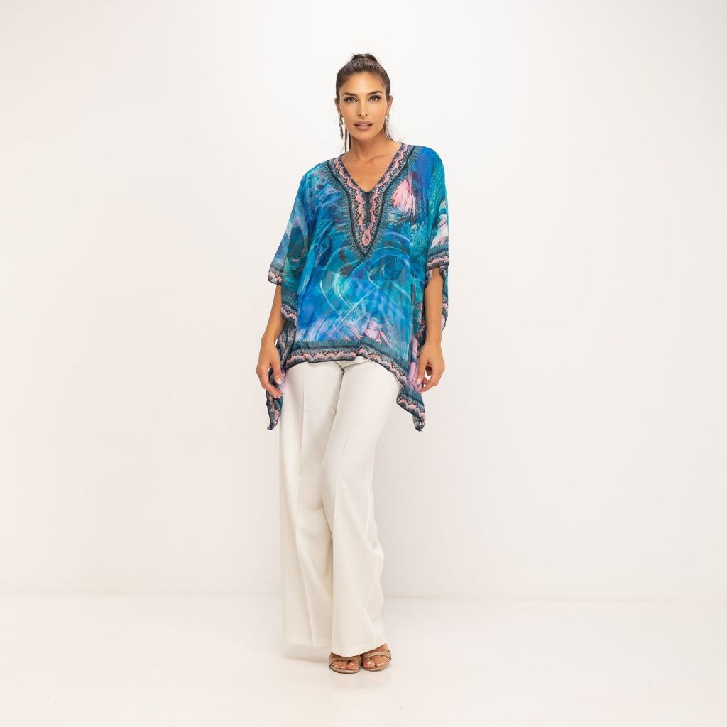 Blusa estampada con pedrería azul MANGO ZARA