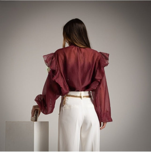 Blusa burdeos o borgoña transparente con volantes