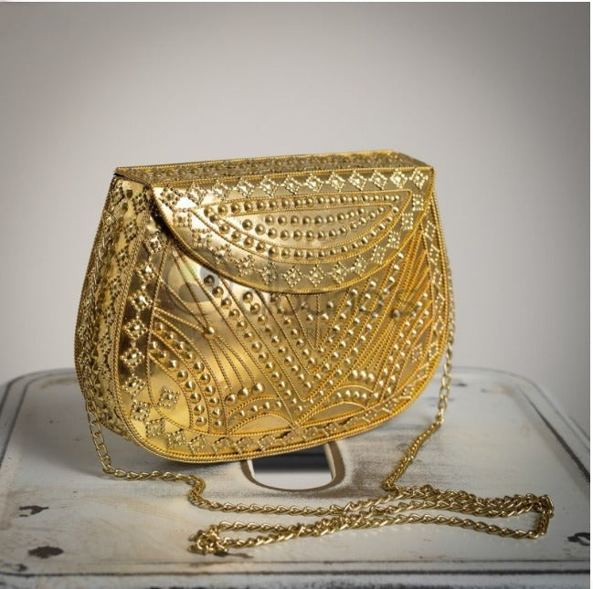 Bolso Rigido Dorado con dibujos grabados