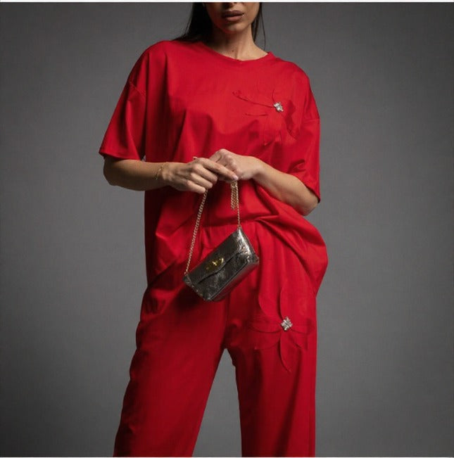 Chandal Rojo con adorno de Margarita joya Moda50