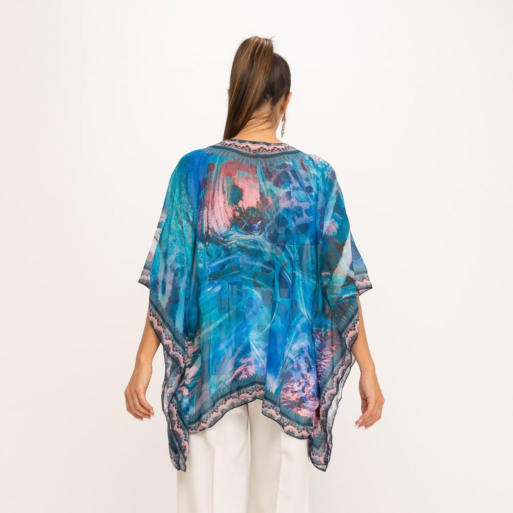 Blusa estampada con pedrería azul