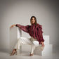 Blusa burgundy o borgoña transparente con volantes