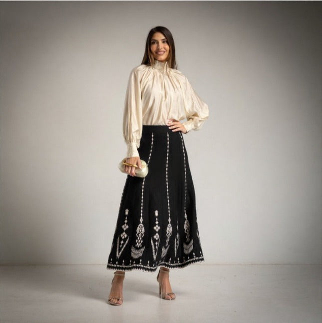 Blusa efecto seda color crudo