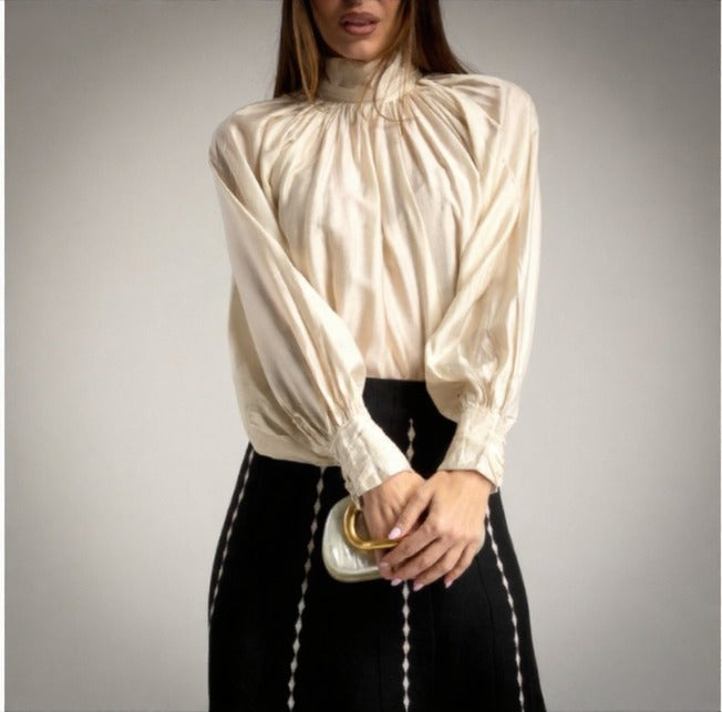 Blusa efecto seda color crudo