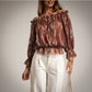 Blusa estampada escote bardot  color teja o caldero