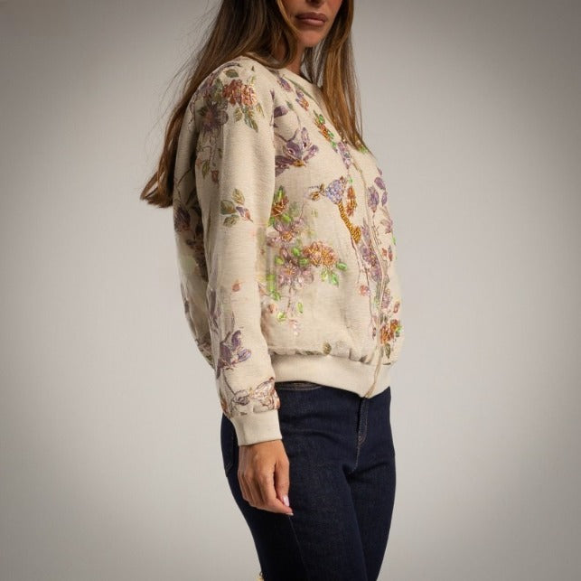 Bomber beige estampado floral con pedrería e hilo dorado