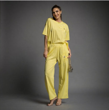 Chandal Amarillo con adorno de Margarita joya
