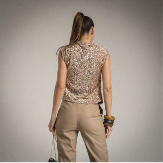 Top crop de lentejuelas con hombreras dorado