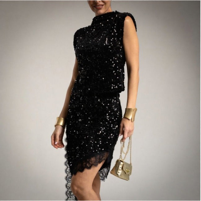 Top_crop_de_lentejuelas_con_hombreras_negro y falda lencera asimetrica de lentejuelas negra