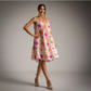 Vestido Corto playero con estampado de conchas naranja y rosa