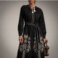 Vestido NEgro cuello mao y bordado de palmeras
