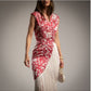 Vestido andaluz rojo con flecos y estampado floral
