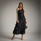 Vestido asimetrico con volantes negro
