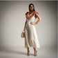 Vestido blanco con volantes en el escote