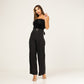 Mono de fiesta negro pantalon palazzio cuerpo de plumas y cinturon con perlas
